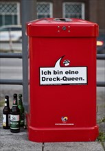 Talking red dustbin I am a dirt queen, campaign by Stadtreinigung Hamburg for more cleanliness,