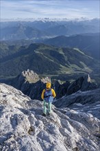 Hiker Looking down into the valley from the Hochkönig, Salzburger Land, Austria, Europe