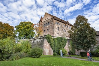 Main building of the Kaiserburg, seen from the castle garden, in autumn, Nuremberg, Middle