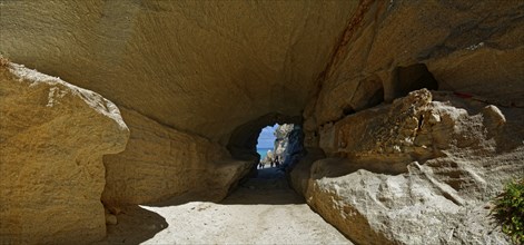 Sanctuary rock passage washed out by the sea to Mare di Tropea beach, Tropea, Vibo Valentia,