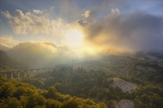 HDR shot, fog, clouds, backlight, bridge, mountains, Madonie National Park, spring, Sicily, Italy,