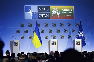 The Ukrainian flag stands on a stage at the NATO summit in Vilnius, Lithuania. Vilnius, 12.07.2023