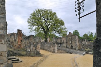 Ruins along the main road The burnt village of Oradour-sur-Glane was destroyed on 10 June 1944 when