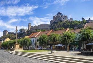 Plague Column at Peace Square with Trencin Castle, Trencin, Slovakia, Europe