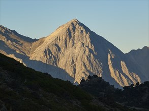 Kallergi Hut, Samaria Gorge, light grey mountain top, morning light, cloudless blue sky, Omalos,