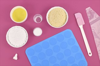 Flat lay with ingredients and tools for baking homemade French Macaron sweets