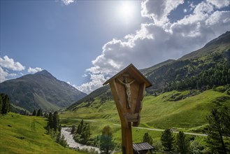 Jesus on the cross against the backdrop of the Alps, Vent, Ötztal, Tyrol, Austria, Europe