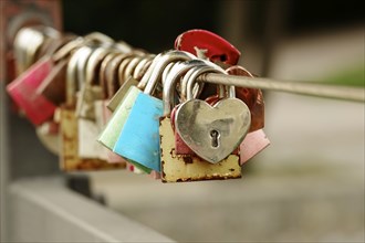 Love locks on a bridge railing, Bavaria, Germany, Europe