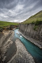 Stuðlagil Canyon, turquoise river between basalt columns, Egilsstadir, Iceland, Europe