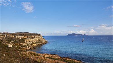 Rocky coast, sailing boats, Levanzo Island, Scogliera di Cala Rossa, Cala Rossa, Favignana, Egadi