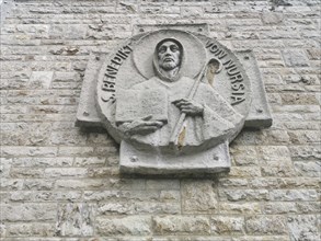 Saint Benedict of Nursia, founder of the order, relief at Münsterschwarzach Abbey, Benedictine