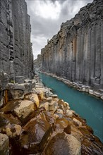 Stuðlagil Canyon, turquoise river between basalt columns, Egilsstadir, Iceland, Europe