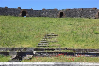 Remains of the audience tiers, steps, The Theatre, Pompeii, ancient city in Campania on the Gulf of