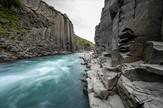 Stuðlagil Canyon, turquoise river between basalt columns, Egilsstadir, Iceland, Europe