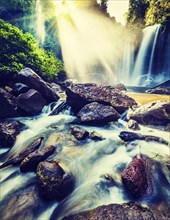 Vintage retro effect filtered hipster style image of tropical waterfall Phnom Kulen, Cambodia, Asia