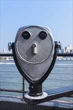 Tower viewer binoculars in face shape, face, eyes, telescope, pier, Manhattan, New York City, USA,