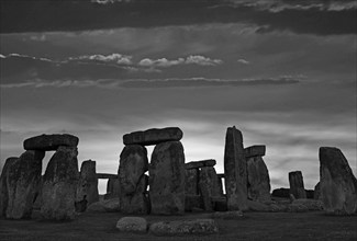 Silhouette of Stonehenge against the evening sky, Salisbury, England, Great Britain