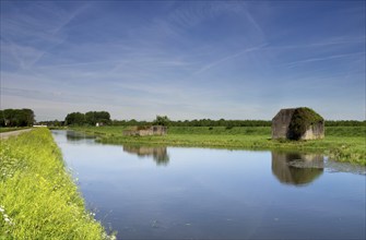 Concrete bunkers along a ditch at Sleeuwijk in the Dutch province of Noord-Brabant