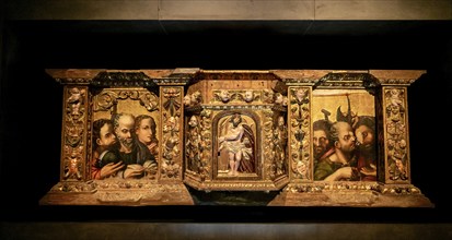 Segovia, Spain, 7 April, 2024: close-up view of a religious triptych painting in the museum of the