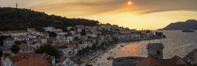 Cloudy mood at sunset by the sea, harbour of Korcula, panoramic shot, island of Korcula, Dalmatia,