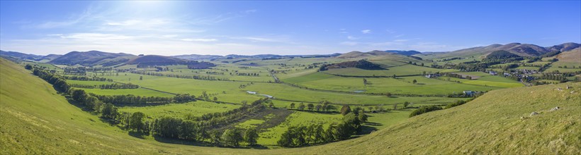 A Panorama Of Rolling Hills In The Scottish Borders On A Beautiful Summer's Day