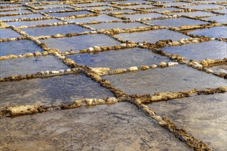 A close-up view of the salt pans in Xwejni Bay on the Maltese island of Gozo