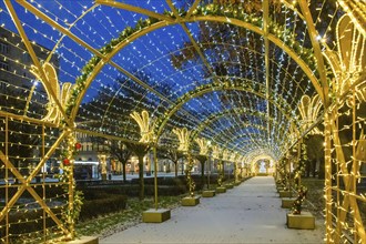 Fantastic Christmas decoration in Warsaw on Krakowskie Przedmiescie street, amazing blue sky at