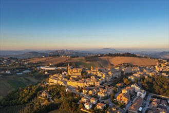 A view of the village of Morrovalle in Marche Province in Italy in warm evening light