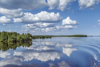 Landscape with a symmetrical reflection on the Vyg river (part of the White Sea-Baltic Canal),