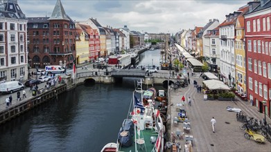 04-24-2023 Copenhagen DEN One if landmark in Copenhagen, Nyhaven (old por) with cafe and old