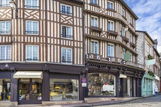 Street with historical half-timbered houses in Honfleur, France, Europe