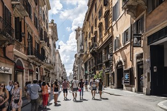 Rome, Italy, August 18, 2016: Tourists in Via del Corso a sunny day of summer. It is a main street