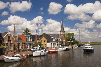 View at the Frisian village Woudsend which is a very busy water sports village in summer