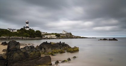 Stroove, Ireland, 9 July, 2022: view of the historic Stroove Lighthouse and beach on the Inishowen