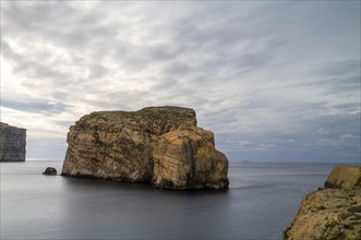 Long exposure landscape view of Dwejra Bay and Ufo Rock on Gozo Island in Malta