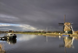 Windmill the Hommel just before a heavy shower