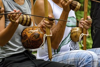 Afro Brazilian percussion musical instruments during a capoeira performance in the streets of