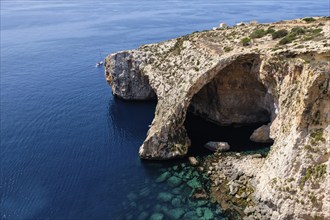 The natural arch of the Blue Grotto photographed from the Blue Wall and Grotto Viewpoint, Qrendi,