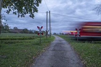 Passing Gräfenberg railway, single-track branch line, at the unrestricted level crossing,