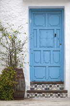 House facade with blue front door, Frigiliana, Costa del Sol, Andalusia, Spain, Europe