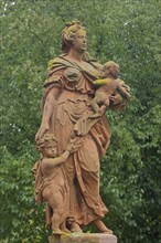 Sculpture by the baroque sculptor Johann Friedrich Joseph Sommer on virtue : love, caritas, female