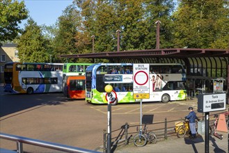 Double-decker busses in city centre bus station, Cambridge, Cambridgeshire, England, UK