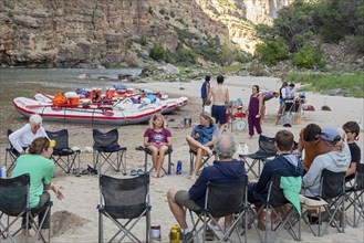 Dinosaur, Colorado, River rafters relax at their campsite on the Green River in Dinosaur National