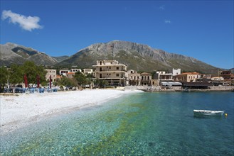 Picturesque coastline with traditional buildings and turquoise waters, Geromilenas, Mani, Laconia,