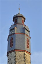 Tower of the Gothic St Mark's Church, church tower with slate roof, spire, Butzbach, Wetterau,