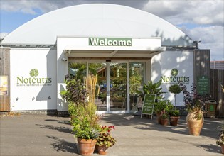 Welcome sign at entrance to Notcutts garden centre, Woodbridge, Suffolk, England, UK