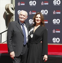 James Bond 60th anniversary celebration. Producers Michael G. Wilson and Barbara Broccoli place