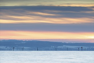 A calm sunset with a pastel-coloured sky over a vast landscape, harbour, Immenstaad, Lake