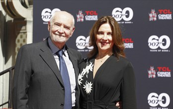 James Bond 60th anniversary celebration. Producers Michael G. Wilson and Barbara Broccoli place