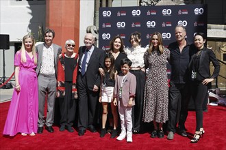 James Bond 60th anniversary celebration. Producers Michael G. Wilson and Barbara Broccoli place